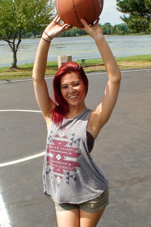 Redhead babe's striptease