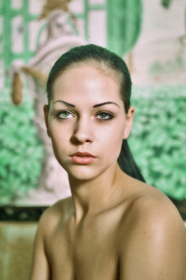 Brunette plays with her naked body