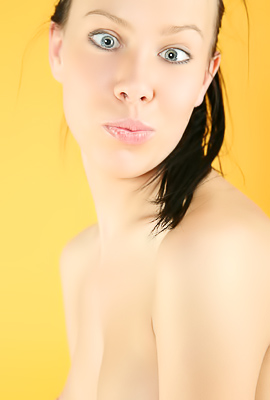 Natalia B and Dahlia tease then go wild with wet fingers and naughty poses on yellow sheets