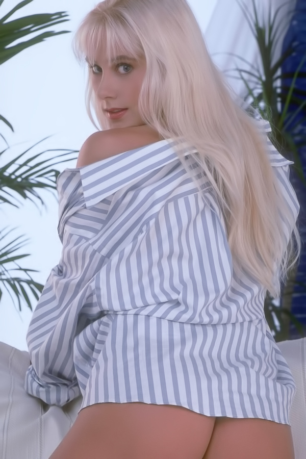 Blonde Sasha plays with her hairy pussy
